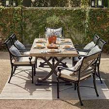 Carlisle Faux Wood Dining Table In Onyx Finish Frontgate Wood Dining Table Round Dining Set Dining Chair Cushions