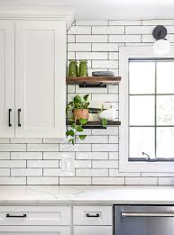 Glass white subway tile |photo: Open Floor Plan Kitchen Renovation Reveal Before And After Little House Of Four Creating A Beautiful Home One Thrifty Project At A Time Open Floor Plan Kitchen Renovation Reveal Before