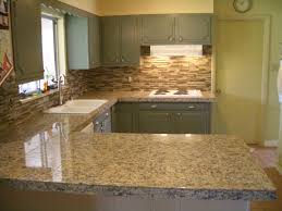 putting in glass mosaic tile backsplash