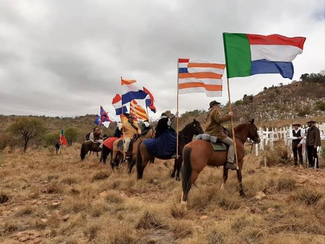Afrikáners flags (Transvaal, Orange Free State at the white cross monument  event.