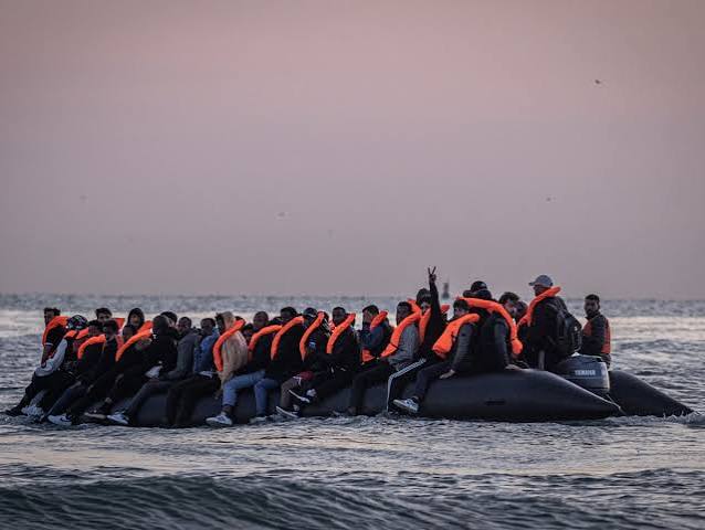 Dinghies at dawn and a determination to arrive: on the French coast waiting to cross to UK | Immigration and asylum | The Guardian