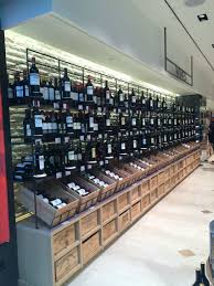 Wine Store Displays Merchandise For Easy Pickings Wine Store Design Wine Store Display Wine Store