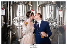 This wedding photography studio is dedicated to capture candid and naturally beautiful emotions and moments as they unfold on the big day, turning them into something tangible to capturing weddings since 2007, turner studio certainly knows how to create stunning imagery out of a wedding. Miller Turner Wedding Destihl Brewery Normal Clinton 0072 Firefly Studio Central Il Design Photography