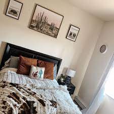 This western themed guest bedroom features a king bed and classic cowboy décor. Pin On Home Decor