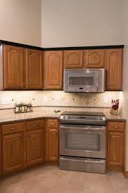 22 pictures what color flooring with oak kitchen cabinets colour photos with hampton bay x in cabinet door sample in hampton medium oak white brown color combinations, best white kitchen cabinets design ideas for white cabinets color pallete. 75 Beautiful Vinyl Floor Kitchen With Light Wood Cabinets Pictures Ideas July 2021 Houzz