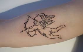 Pin By Reese Goldman On Tatted Up Cupid Tattoo Cherub Tattoo Cute Tattoos Cartoon tattoos have been popular for quite some time; cupid tattoo cherub tattoo