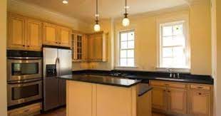 What Color Paint Looks Good With Natural Maple Cabinets John Wollwerth Hemera Getty Images Yellow Kitchen Walls Maple Kitchen Cabinets Kitchen Colors