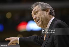 Joey Graham of the Oklahoma State Cowboys wears a piece of the net in...  News Photo