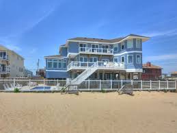 Atlantic Escape Is A Oceanfront Sandbridge Rental With 12 Bedrooms And 13 Bat Vacation Homes For Rent Virginia Beach Vacation Rentals Virginia Beach Vacation