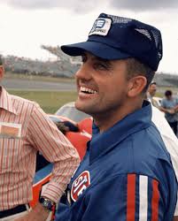 Driver Glen “Fireball” Roberts (R) won the pole position for the Daytona  500 NASCAR Grand National (Cup) Series race at the Daytona International  Speedway driving this Pontiac owned by Banjo Matthews (L)