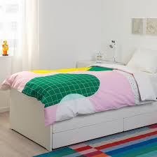 mojlighet pink graphical patterned quilt cover and pillowcase 150x200 50x80 cm ikea in 2021 bed frame bed storage pull out bed