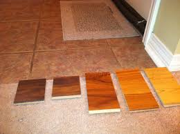 We carry a large selection of underlayment to absorb sound and prevent moisture damage as well as laminate floor. Kitchen Tile And Laminate Wood Contrast