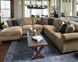 Amandine 5 Piece Sectional Elevates The Art Of Living Comfortably Deep Plush Back Cushions And Reversible Seat Furniture Ashley Furniture Living Room Designs