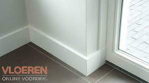 goedkope overschilderbare mdf moderne plint 120x15 wit gegrond vind je altijd voordelig en snel geleverd bij de groothandel plinten houten kaders laminaatvloer