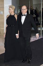 Princess Charlene Donned A Stylish Ruffled Black Floor Length Gown Teamed With Diamond Earrings And Black He Princess Charlene Royal Fashion Charlene Of Monaco
