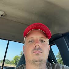 How to fix a poorly installed concrete slab with expansion joint against  the foundation?