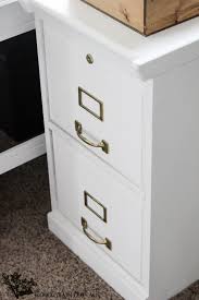 My filing cabinet only had two plastic handles and a key lock, so i covered both in the everlasting chalky finish paint. How To Paint A Filing Cabinet The Wood Grain Cottage