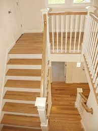 A basement stairs needs a landing for security purposes. Two Level Hardwood Stairs With Landing Connect To Open Hallway Hardwood Stairs Stairs Stairs In Kitchen