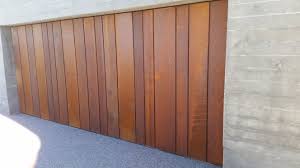 Recess Counterweight Garage Door Clad With Corten Garage Doors Concrete House House Design
