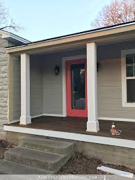 Spring has sprung in indy and what better way to enjoy it by sitting on the front porch looking at the tulips and kids playing/crawling in the grass, right? How To Wrap Front Porch Posts Turn Skimpy Front Porch Posts Into Pretty Columns Part 1 Addicted 2 Decorating