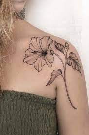 23 Flower Tattoos Designs And Meanings For Your Inspo Hibiscus Flower Tattoos Hibiscus Tattoo Meaningful Flower Tattoos
