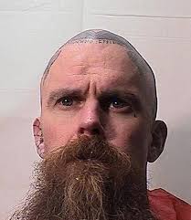 Nineteen members/associates of the Mexican Mafia prison gang were charged  by the Los Angeles County DA for their roles in a conspiracy to murder a  well-known rapper, popular