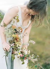 Scottish wedding flowers bridal bouquet. Minimalist Yet Wild Bridal Shoot In The Scottish Highlands Scotland Wedding Inspiration