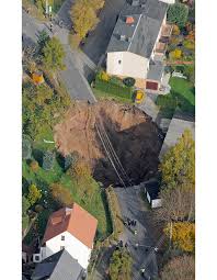 sinkholes, craters and collapsed roads