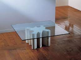 Your choice of coffee table is vital in terms of its beauty appearance and the functionality. Coffee Table With Base Made Of Stone Top In Glass Idfdesign
