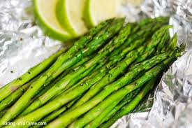 Place foil pack asparagus right on top of the flames and cook for around 20 minutes. Grilled Asparagus Recipe How To Grill Asparagus In Foil