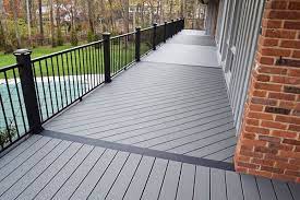 trex deck in pebble grey with black railing looking for endless color and style choices without the maint deck designs backyard synthetic decking outdoor deck