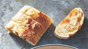 Make Garlic Bread Even Better With A Spicy Red Pepper Flakes Recipe Stuffed Peppers Bread Garlic Bread