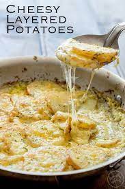 Cheesy Layered Potatoes Potatoes Cream And Cheese Seriously What Could Be Better Layers Of Potato And Onion Cook Layered Potato Cheesy Potato Bake Recipes