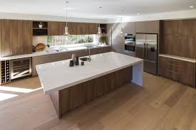 Large Modern Contemporary Kitchen In Warm Tones With A Huge Island Bench Www Thekitchendesi Kitchen Design Centre Modern Kitchen Design Large Kitchen Design