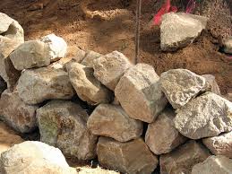 Define your sitting area with sleek stone or paver benches. How To Build A Seating Wall How Tos Diy