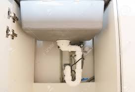 Maybe you would like to learn more about one of these? Close Up On Ceramic Kitchen Sink Installation With Sink Drain Tubes Plumbing Stock Photo Picture And Royalty Free Image Image 93513111