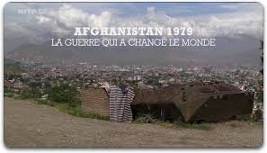 An afghan national army soldier surveying atop a humvee; 1979 War Veteran Testimonies