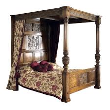 Style blogger kallie feigenbaum created a dramatic, vintage feel by hanging satin bed canopy ideas using curtains. The History Of The Four Poster Bed Furniture History Tudor Oak Blog