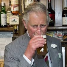 Charles and Camilla pull pints at pub ...