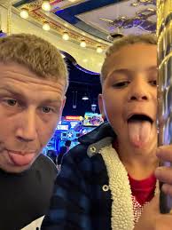 can you edit photo of son holding lobster?