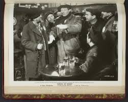 Danny Kaye in tavern with men