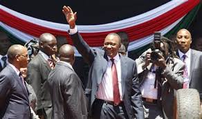 Appartenant à l'ethnie kikuyu, il est le fils de jomo kenyatta, premier président de la république entre 1964 et 1978. Kenya Swears In President West Faces Balancing Act