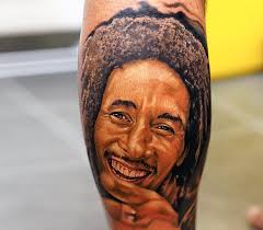 Laughing bob marley portrait tattoo on left shoulder. Bob Marley Tattoo By Khan Tattoo Photo 15261