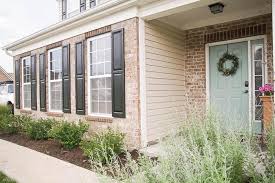 Homeadvisor's exterior shutter cost guide gives prices for house shutters, exterior rolling shutters, window and door security shutters, and bermuda/bahama types. How To Paint Shutters And A Front Door Simply Designing With Ashley