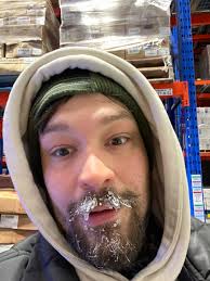 bass player's unusual face expression