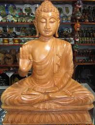 The legs of the buddhas were broken because of aurangzeb's action. Buddhist Wood Carving Wood Carving Hd Images