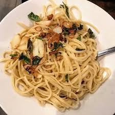 In a separate bowl, mix grated parmesan with lemon juice, olive oil and a bit of warm water. My Side Garlic Oil Pasta To My Lobster Clam Bake Picture Of Popei S Clam Bar Seafood Restaurant Deer Park Tripadvisor