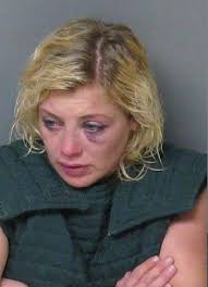 Woman Goes After Husband With Machete, Kicks Officer