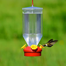 The noise of the mister will attract the birds, as will the airborne sparkles and glistening leaves, and hummingbirds will rub against wet leaves to bathe. Perky Pet Lantern Hummingbird Feeder Model 201