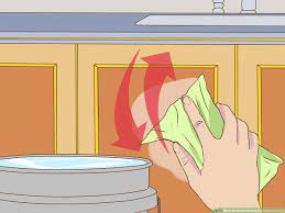 Don't forget to wipe down the hardware as well. 3 Ways To Clean Greasy Kitchen Cabinets Wikihow